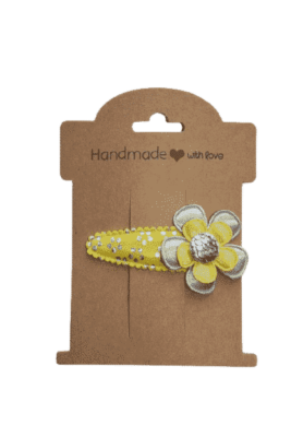 Geel haarspeldje met bloem