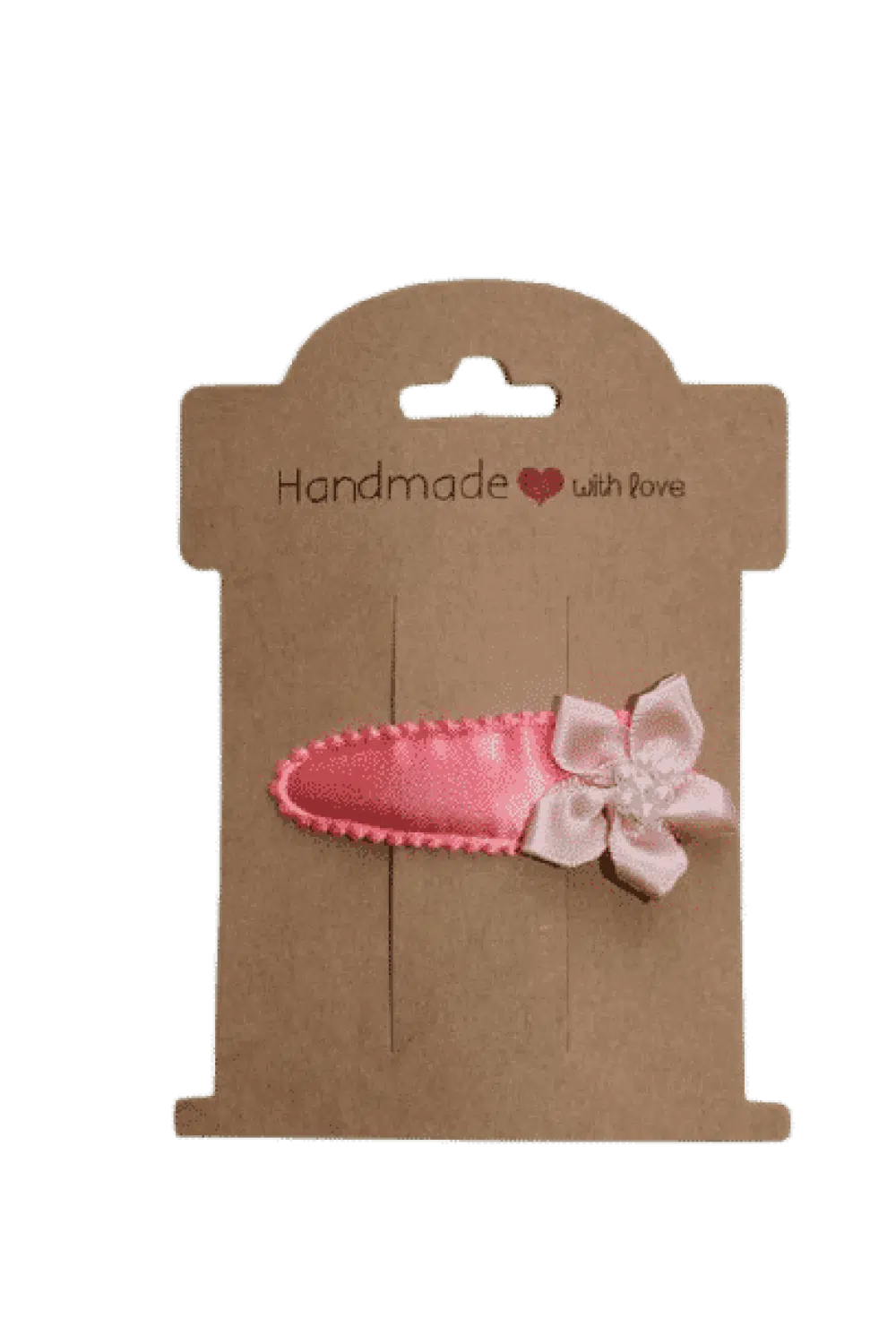 Roze haarklipje met bloem